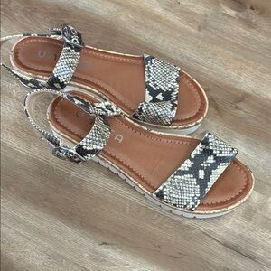 Unisa Snake-Print Slingback Sandals in Black and Tan